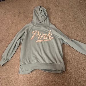 From the store pink. Olive green hoodie. Size medium in womens.